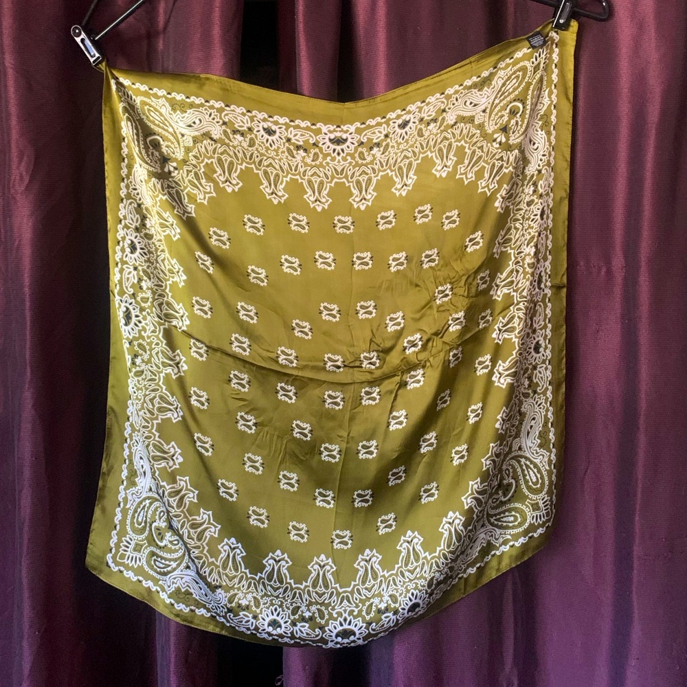 Olive-colored 
100% polyester 
Handkerchief scarf
27” x 27”
No brand 
worn once?